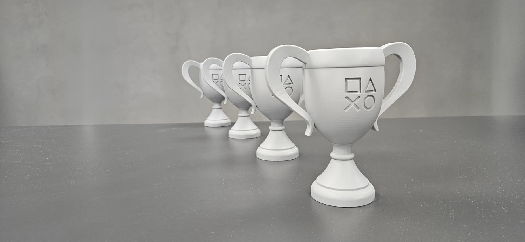 Série herních trofejí z 3D tisku SLA pro esport turnaj.
